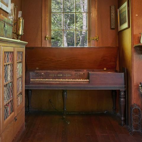 View of historic desk and furniture in the library exhibit